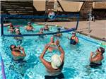 People playing volleyball in the pool - thumbnail