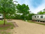 Open RV space with sitting area at site Sun Retreats Texas Hill Country - thumbnail