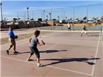 View larger image of Couples playing pickleball at WESTWIND RV  GOLF RESORT image #6