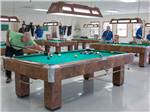 View larger image of A group of men playing pool at TROPHY GARDENS image #4