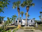 RV parked near panic table at Sun Outdoors Panama City Beach - thumbnail