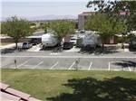 View larger image of Parking spaces and back in RV sites at DESERT WILLOW RV RESORT image #4