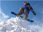 View larger image of A person snowboarding at DESERT WILLOW RV RESORT image #12