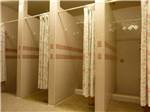Some of the clean shower stalls at MCARTHUR'S TEMPLE VIEW RV RESORT - thumbnail