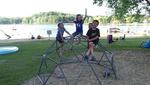 Kids playing on a geodesic dome - thumbnail