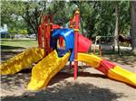 The yellow slides for the kids at CAMELOT CAMPGROUND QUAD CITIES - thumbnail