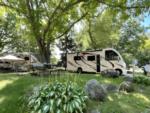 Panic area next to parked RV's at site Sun Retreats Fond du Lac East - thumbnail