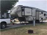 A fifth wheel trailer in an RV site at CAMP ERIEZ - thumbnail