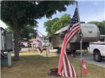 An American flag at an RV site at CAMP ERIEZ - thumbnail