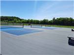 The blue pickleball courts at RIVERSIDE RV PARK & RESORT - thumbnail