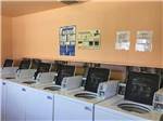 View larger image of Washing machines in the laundry room at HOLIDAY PALMS RESORT image #12