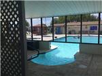 View larger image of The indooroutdoor pool at ALAMO ROSE RV RESORT image #2