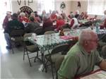 People eating inside at Christmas time at VIP RV RESORT & STORAGE - thumbnail