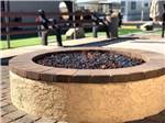 View larger image of A fire pit with glass at VIP RV RESORT  STORAGE image #12
