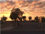 View larger image of Dusk skies over RV park at OK RV PARK image #11
