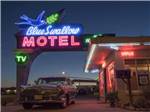 The neon Blue Swallow Motel sign at MOUNTAIN ROAD RV PARK - thumbnail