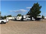 A group of gravel RV sites at MOUNTAIN ROAD RV PARK - thumbnail