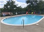 View larger image of The oval shaped swimming pool at WANDERLUST RV PARK image #2