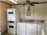 View larger image of Laundry room under a ceiling fan at WANDERLUST RV PARK image #7