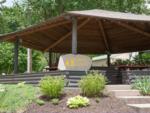 Picnic benches under the pavilion at RENFRO VALLEY KOA HOLIDAY - thumbnail