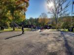 Campers walking near trees and hills at RENFRO VALLEY KOA HOLIDAY - thumbnail