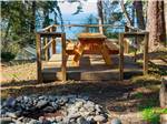 Table and fire pit at site - thumbnail