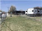 The fenced in pet area at COWTOWN RV PARK - thumbnail