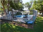 The fenced in swimming pool at LUBBOCK RV PARK - thumbnail