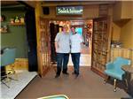 A couple of men standing in front of the steakhouse doorway at TOPAZ LODGE RV PARK & CASINO - thumbnail
