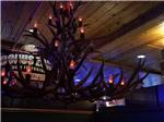 A chandelier made of elk horns at TOPAZ LODGE RV PARK & CASINO - thumbnail