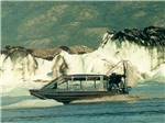 A boat traveling near glaciers near MOUNTAIN VIEW RV PARK - thumbnail