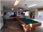 View larger image of The pool tables in the clubhouse at LITTLE VINEYARD RV RESORT image #9