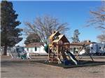 View larger image of The playground equipment at LITTLE VINEYARD RV RESORT image #10