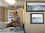 Man from the side behind the counter at Valley View RV Park - thumbnail