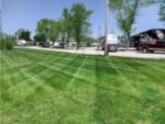 A view of the gravel RV sites at PINE GROVE MHC & RV COMMUNITY - thumbnail