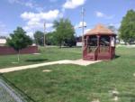 A gazebo in the fenced pet area at PINE GROVE MHC & RV COMMUNITY - thumbnail
