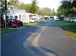 View larger image of The road leading down RV sites at FIG TREE RV RESORT image #8