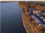 An aerial view of the RV sites by the water at DUCK ISLAND RV PARK & FISHING RESORT - thumbnail