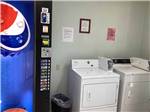 A pair of dryers next to a soda machine at BLACK RABBIT RV PARK - thumbnail