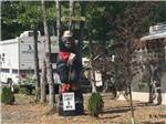 View larger image of Statue of bear with construction hat and bandana at BLACK BEAR CAMPGROUND image #9
