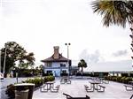 View larger image of Picnic tables outside of the clubhouse at HILTON HEAD HARBOR RV RESORT  MARINA image #7