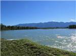 View larger image of The river with mountains in the background at SPRUCE PARK ON THE RIVER image #3