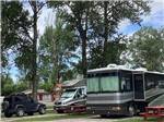 View larger image of Class A motorhome and Sprinter parked in gravel site at SPRUCE PARK ON THE RIVER image #10