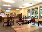 Inside eating area with tables and chairs at CLABOUGH'S CAMPGROUND - thumbnail