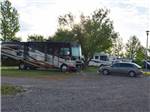 View larger image of A motorhome in a gravel campsite at GRANDVIEW CAMP  RV PARK image #6