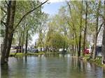 View larger image of The waterway between the RV sites at CAMP LORD WILLING RV PARK  CAMPGROUND image #6