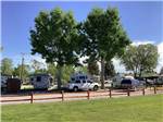 A line of gravel RV sites at SOUTHSIDE RV PARK - thumbnail