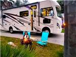 View larger image of Folding chairs in front of a motorhome at VENTURA BEACH RV RESORT image #11