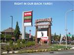 View larger image of Sign at entrance to the Outlet Mall at PORTLAND WOODBURN RV PARK image #3