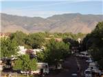 View larger image of Aerial view of campground with mountains in background at CARSON VALLEY RV RESORT  CASINO image #2